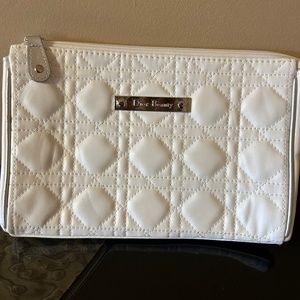 Dior quilted white PVC make up bag.